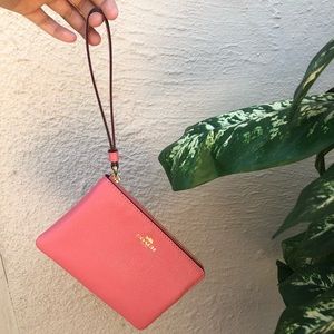 Pink coach zip up hand wallet